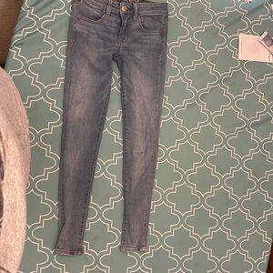 American eagle blue jeans super super stretch size 2.